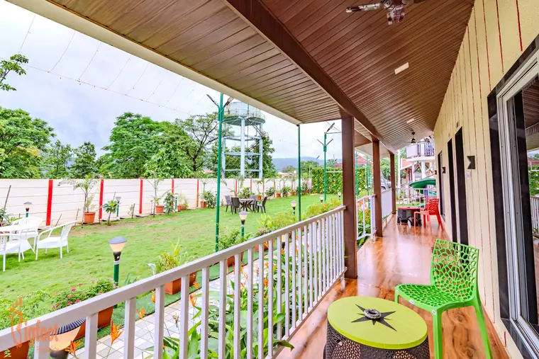 Balcony overlooking the garden at JS Farm Resort, Karjat