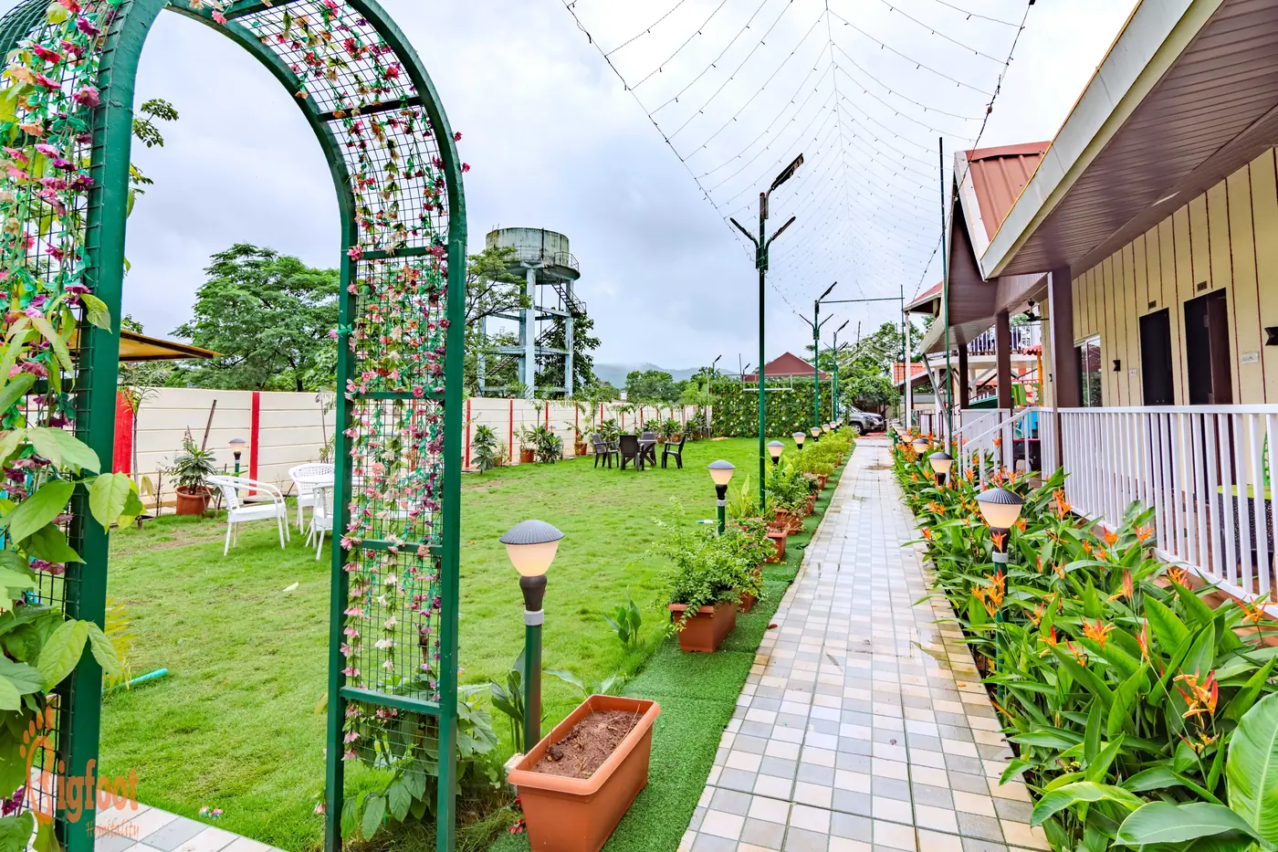 Cottages and lawn at JS Farm Resort, Karjat