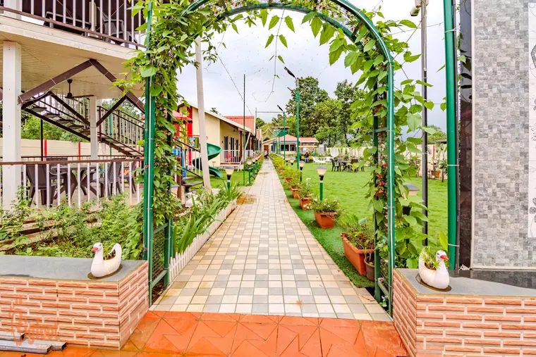 Wide open lawn for group gatherings at JS Farm Resort, Karjat