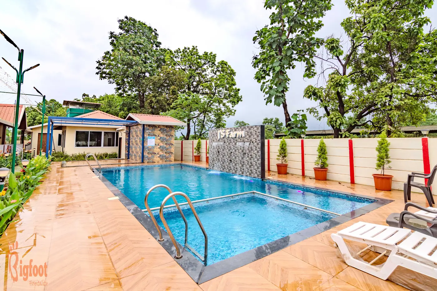 Swimming pool with kids pool section at JS Farm Resort, Karjat
