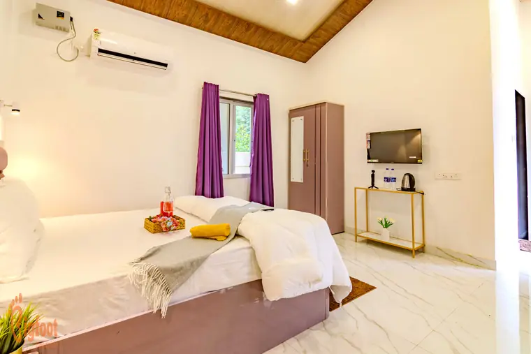 Deluxe Room interior at JS Farm Resort, Karjat